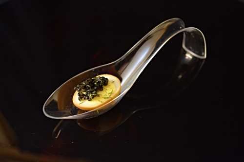 Black caviar with smoky quail eggs